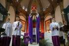 A Catholic priest celebrates Sunday Mass in Beijing in this Dec. 4, 2016, file photo. In a special message addressed &quot;to the Catholics of China and to the universal church,&quot; released by the Vatican Sept. 26, Pope Francis said he hoped a recent Sin-Vatican agreement would help &quot;restore full communion among all Chinese Catholics.&quot;