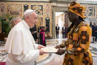 Pope Francis receives letters of credential from Filomena Mendes Mascarenhas Tipote, the new ambassador of Guinea Bissau to the Holy See, during a ceremony May 23, 2019, in the Clementine Hall of the apostolic palace at the Vatican. 