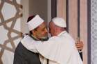 Pope Francis embraces Sheik Ahmad el-Tayeb, grand imam of al-Azhar University, at a conference on international peace in Cairo April 28. The Pope was making a two-day visit to Egypt.