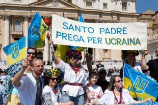 Ukrainian church leaders denounced plans to allow same-sex unions through reforms saying that the provisions will destroy the basic social institution of the family in a July 23 letter. In this photo, Ukrainians attend Pope Francis&#039; general audience in St. Peter&#039;s Square at the Vatican June 10. The sign in Italian says, &quot;Holy Father, Pray for Ukraine.&quot;