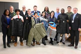 Various members of the CCAS, CCAF,  Knights of Columbus and students from Northmount and De La Salle College &quot;Oaklands” during the coat delivery on Dec. 6