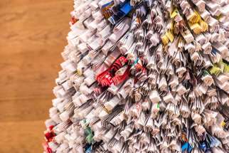 Robyn Thomas&#039;s &quot;A Christmas Story&quot; is a Christmas tree made out of pages from &#039;The Walrus&#039; magazine. 12 artists are displaying their Christmas tree artwork at Toronto&#039;s Gardiner Museum.