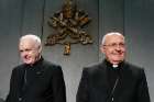 U.S. Cardinal Edwin F. O&#039;Brien, grand master of the Knights of the Holy Sepulchre, and Cardinal Leonardo Sandri, prefect of the Congregation for Eastern Churches, arrive for a press conference at the Vatican Nov. 7. The Knights are preparing for a major meeting in Rome. 