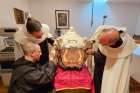 The silver coffin containing the body of St. Teresa of Avila in Alba de Tormes, Spain, is opened for the first time since 1914 and marked the beginning of a study of her relics, which will be carried out by Italian doctors and scientists with Vatican approval.