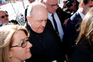  Archbishop Philip Wilson of Adelaide, Australia, arrives Aug. 14 at Newcastle Local Court. The Australian court has approved house arrest of Archbishop Wilson, who had been found guilty by an Australian court of failing to inform police about child sexual abuse allegations.