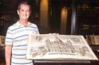 Pearce Carefoote, with one of the books at the Thomas Fisher Rare Book Library, says he’s encouraged by Pope Francis’ approach toward acceptance of gay people.