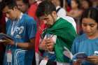 World Youth Day pilgrims from Mexico pray as Pope Francis leads the Way of the Cross at Santa Maria la Antigua Field in Panama City Jan. 25, 2019. 