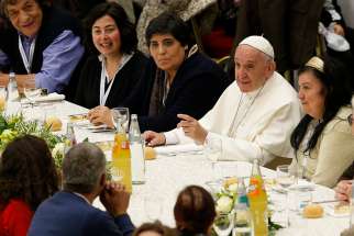 Pope Francis eats lunch with the poor in the Paul VI hall after celebrating Mass marking the first World Day of the Poor at the Vatican Nov. 19. Some 1,200 poor people joined the pope for the meal. 