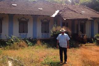 Fr. de Souza outside his maternal grandmother’s now-abandoned home in Loutolim, Goa, India.