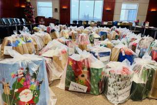 A room in the London Catholic board office filled with Christmas gift bags to be delivered as part of the board’s Christmas Gift Program.