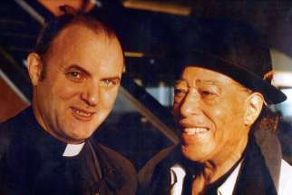Fr. Gerald Pocock, left, with jazz great Duke Ellington. The two were great friends