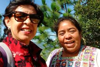 Martha Ines Romero of Pax Christi, left, and Sr. Maudilia Lopez Cardona have been helping Indigenous communities in Latin America deal with the effects of mining operations.