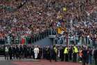 Pope Francis arrives for an encounter with more than 50,000 Catholic charismatics at the Olympic Stadium in Rome June 1. The pope knelt onstage as the crowd prayed over him by singing and speaking in tongues. During the event the pope acknowledged he had once been uncomfortable with the charismatic movement. 