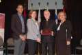 After receiving his Award of Merit, Fr. Pat Fitzpatrick poses for a photo with Toronto Catholic student trustee William Lawrence, left, chair Jo-Ann Davis and director of education Angel Gauthier (far right).