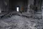 Damaged pews lie amid rubble inside Holy Saviour Cathedral in Shusha, Azerbaijan, after shelling.