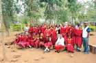 Sr. Ephigenia Gachiri with this year’s graduates of the Christian rite of passage. Gachiri developed a rite-of-passage ritual based on the RCIA program as an alternative to a cultural ritual rite that involves female genital mutilation.