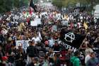 Demonstrators take part in a Jan. 9 protest against a fuel price hike in Mexico City.