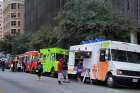 Food trucks seen in Austin, Texas in 2014. Mobile Loaves and Fishes is a Christian non-profit founded by Graham and five other men that delivers about 1,200 meals and essentials from 12 food trucks to homeless people on the streets of Austin every night.