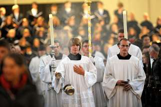 An altar server swings a censer during the opening Mass of the annual meeting of the German bishops&#039; conference in 2010 in Fulda. A 350-page document leaked to German media and published Sept. 12 documents nearly 3,700 cases of alleged sexual abuse of minors by Catholic priests, deacons and clergy in Germany over a 68-year period. 