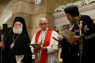 Pope Francis and Coptic Orthodox Pope Tawadros II, right, attend an ecumenical prayer service at the Chruch of St. Peter in Cairo April 28. The pope was making a two-day visit to Egypt.
