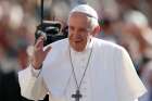 Pope Francis greets the crowd during his general audience in St. Peter&#039;s Square at the Vatican Nov. 7. 