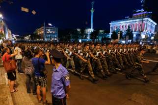 Ukrainian soldiers march along a street during a rehearsal for the Independence Day parade in Kiev Aug. 20. The parade will take place Aug. 24.