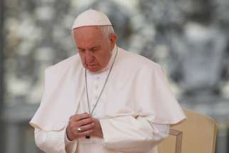 Pope Francis prays during his general audience in St. Peter&#039;s Square at the Vatican May 22, 2019.