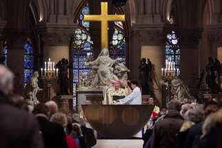 Paris Archbishop Laurent Ulrich presides over the inaugural Mass, at Notre Dame Cathedral, five-and-a-half years after a fire ravaged the Gothic masterpiece, in Paris, Dec. 8, 2024.