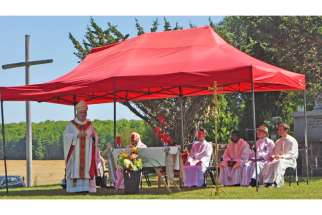 Cardinal Thomas Collins, archbishop of Toronto, celebrated a special liturgy Aug. 15 commemorating the 400th anniversary of the first Catholic Mass in Ontario near present-day Lafontaine. The open-air event attracted hundreds of residents from across Ontario to southern Georgian Bay.
