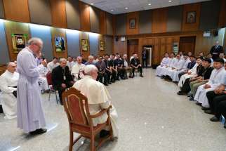 Pope Francis meets with Jesuits in Tha Kham, Thailand, Nov. 22, 2019, during his apostolic trip to the Asian country. In his customary question-and-answer session with his Jesuit confreres, Pope Francis spoke about resistance to addressing climate change and about hostility to migrants and refugees.