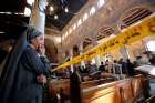 A nun cries as she stands inside St. Mark&#039;s Coptic Orthodox Cathedral Dec. 11, 2016 after an explosion inside the cathedral complex in Cairo. A bomb ripped through the complex, killing at least 25 people and wounding dozens, mostly women and children.