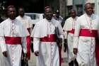 Congolese Bishop Fidele Nsielele Zi Mputu, Archbishop Marcel Utembi Tapa and Bishop Fridolin Ambongo Besungu arrive in December 2016 to mediate talks between the opposition and the government of President Joseph Kabila in Kinshasa.