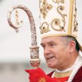 Bishop Bernard Fellay, superior of the Society of St. Pius X, addresses the crowd before a 2009 ordination ceremony in Econe, Switzerland.