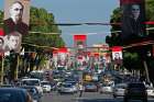 Photographs of Albanian priests killed during the former communist regime hang in the main boulevard of Tirana, Albania, Sept. 17, 2014. 