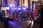 Police and emergency workers move victims to waiting ambulances after an accident at a Christmas market on Breitscheidplatz square in the west of Berlin, Germany, on Dec. 19, 2016. 