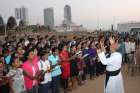 Father Jude Nicholas leads members of the choir during rehearsal at Galle Face Green Jan. 11 in Colombo, Sri Lanka. Pope Francis is scheduled to visit Sri Lanka Jan. 13-15.