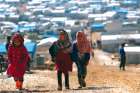 Internally displaced Syrian children walk together at a camp near the Turkish border in Atmeh, Syria. Syrian refugees have been the greatest recipient of Canada’s refugee program in the last five years, with two-thirds ending up in the privately-sponsored refugee program.