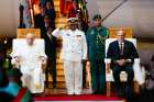 Pope Francis and John Rosso, deputy prime minister of Papua New Guinea, take their seats on a covered platform at Jacksons International Airport for an official welcome ceremony in Port Moresby, Papua New Guinea, Sept. 6, 2024.