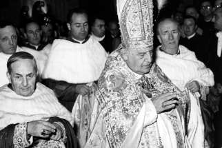 Blessed John XXIII prays after his election in 1958.