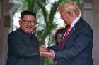 North Korean leader Kim Jong Un and U.S. President Donald Trump meet at the Capella Hotel on Sentosa island in Singapore June 12. Signing a joint statement, President Trump agreed to provide security guarantees to North Korea and Chairman Kim reaffirmed his commitment to the complete denuclearization of the Korean Peninsula.