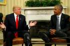 President-elect Donald Trump gestures during a Nov. 10 meeting with U.S. President Barack in the Oval Office of the White House in Washington.