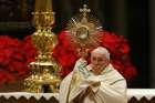  Pope Francis leads Benediction during a prayer service on New Year&#039;s Eve in St. Peter&#039;s Basilica at the Vatican Dec. 31. 