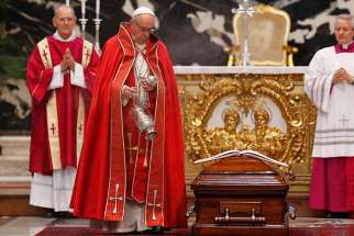  Pope Francis uses holy water to bless the casket of French Cardinal Jean-Louis Tauran during his funeral Mass in St. Peter&#039;s Basilica at the Vatican July 12. Cardinal Tauran, who announced the election of Pope Francis, had a long career as a Vatican diplomat and later worked on interreligious dialogue. He died July 5 at the age of 75 in Hartford, Conn. 