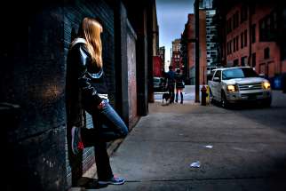 Photo illustration of a young woman depicts the effects of human trafficking. Robert Kinghorn writes that the good news of the Church on the Street is not reported alongside the murders and the overdoses in secular newspapers.