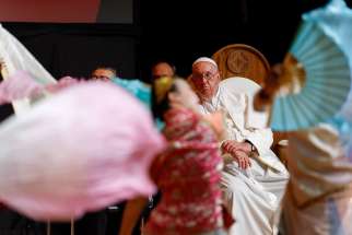 Pope Francis watches members of the Diverse Abilities Dance Collective perform at an interreligious meeting with young people at the Catholic Junior College in Singapore Sept. 13, 2024.