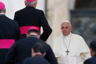 Pope Francis prepares to meet bishops during his general audience in St. Peter&#039;s Square at the Vatican Sept. 19.