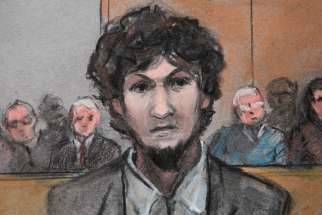 In this courtroom sketch, convicted Boston Marathon bomber Dzokhar Tsarnaev stands as he is sentenced to death at the U.S. courthouse in Boston May 15.