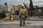 Firefighters work in Jasper, Alberta, July 26, 2024, after wildfires roared into the resort town in the Canadian Rockies in the overnight hours of July 24 and 24.