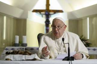 Seated in the chapel of his Vatican residence because of a cold, Pope Francis gives his usual Sunday reflection on the day&#039;s Gospel reading before leading the recitation of the Angelus prayer by video with people gathered in St. Peter&#039;s Square Dec. 22, 2024.