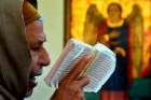 The father of a man who was killed by Islamic State militants in Libya earlier this year attends a service in the Virgin Mary Church near Cairo May 3.